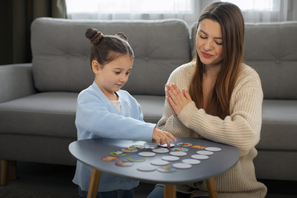 front view mother girl playing game